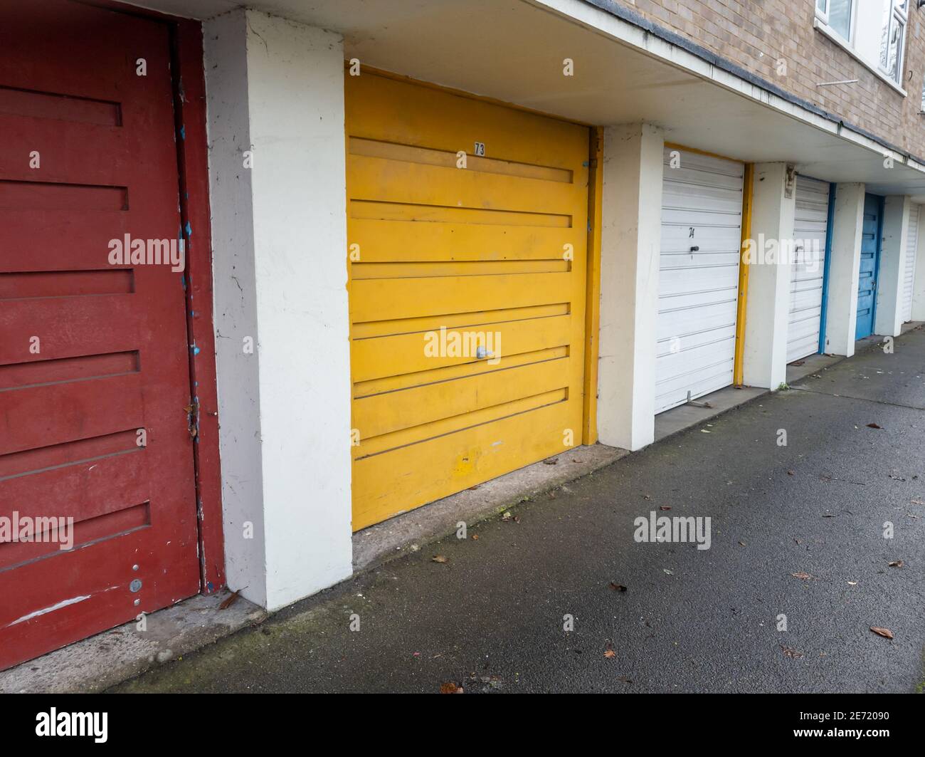 Colourful car garages or lock ups which is often used for storage. Stock Photo
