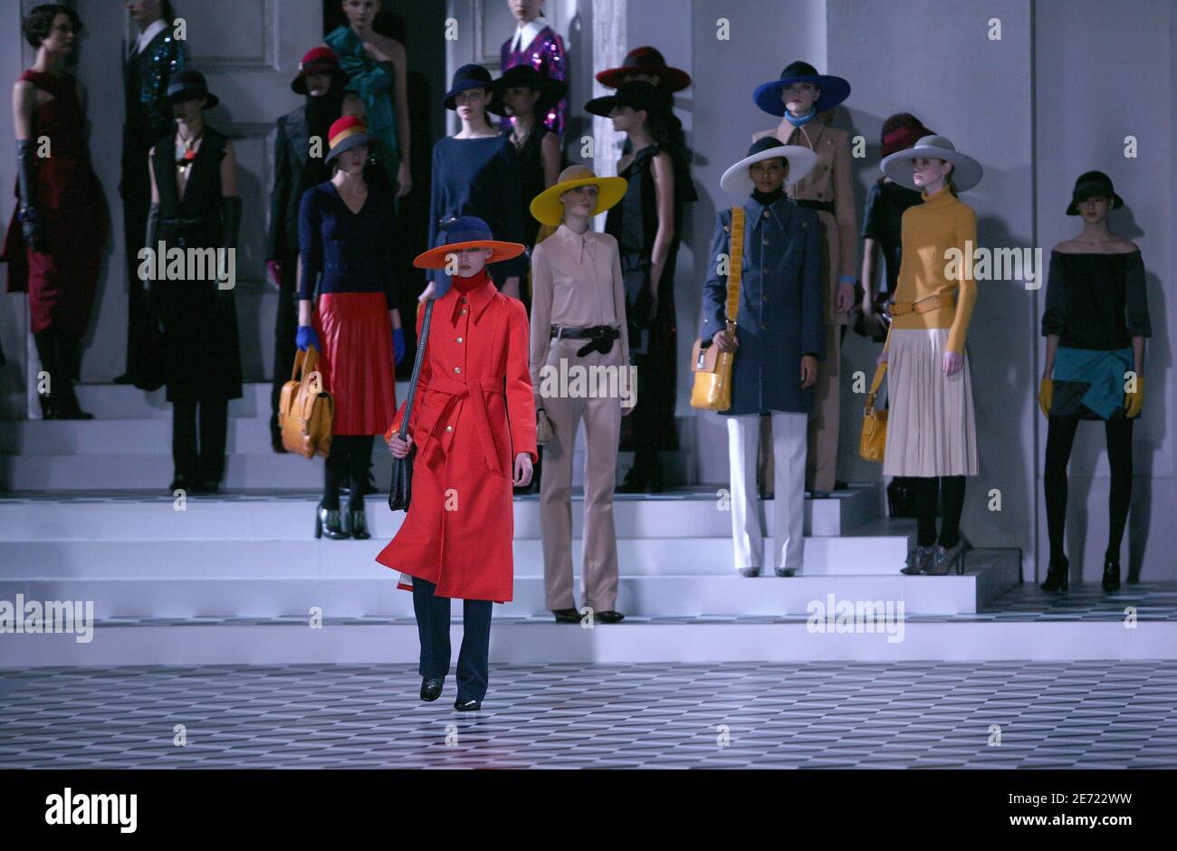 Models display a creation by designer Marc Jacobs for the Louis Vuitton  Fall-Winter 2007-2008 Ready-To-Wear collection presentation, held at the '  Cour carree du louvre', in Paris, France, on March 4, 2007.