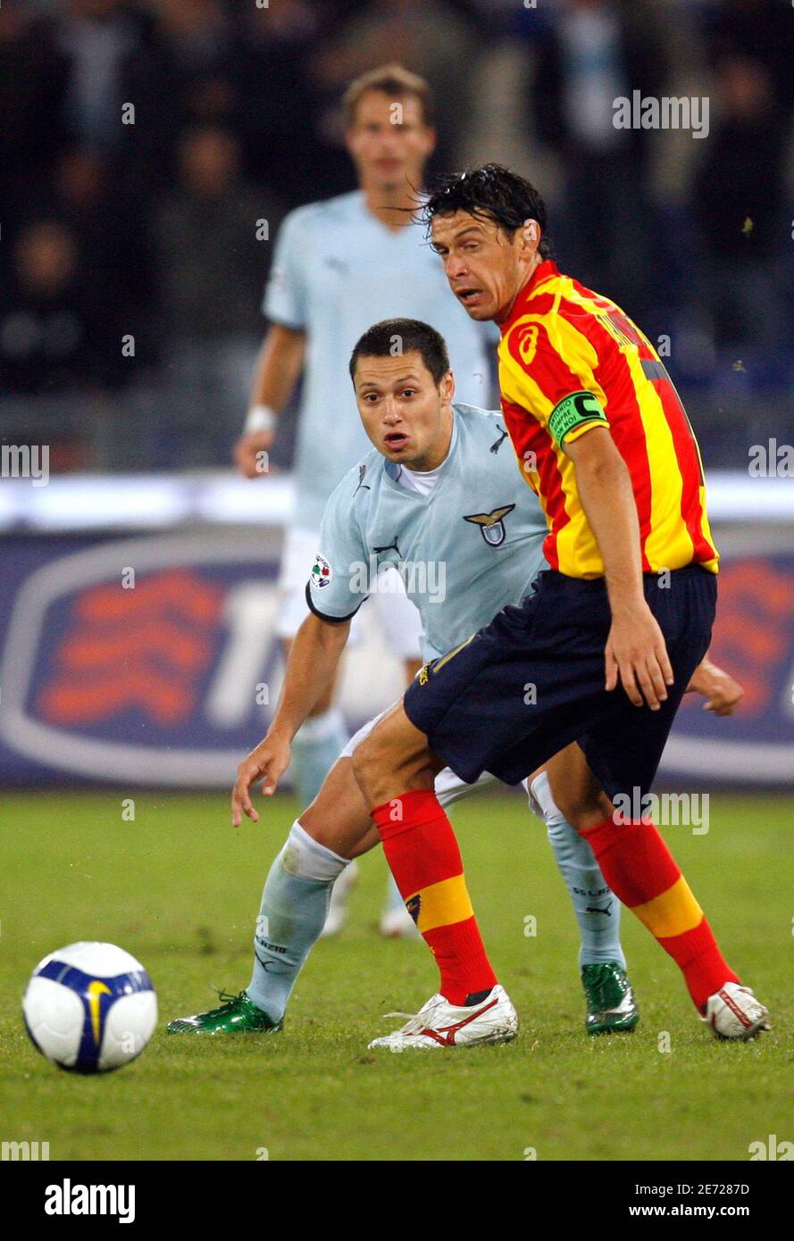 Lazio's Mauro Matias Zarate (L) and Lecce's Andrea Zanchetta fight for the  ball during their Italian Serie A soccer match at the Olympic stadium in  Rome October 4, 2008. REUTERS/Giampiero Sposito (ITALY
