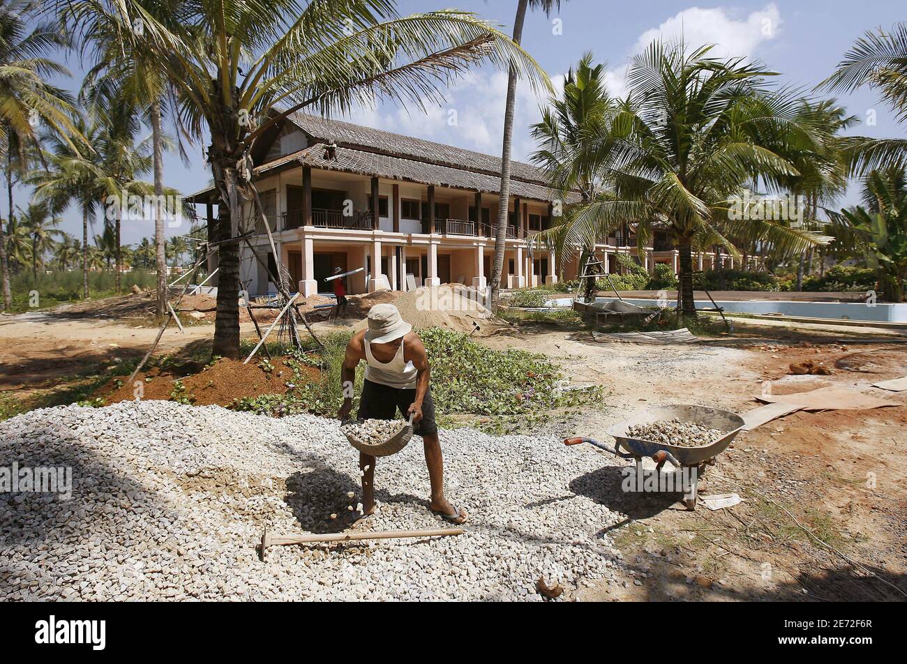 Workers rebuild hotel in Khuk Khak, Thailand, in January 2007. Two years since the Indian Ocean tsunami killed over 300,000 people, life and tourism restart gradually. Photo by Patrick Durand/ABACAPRESS.COM Stock Photo