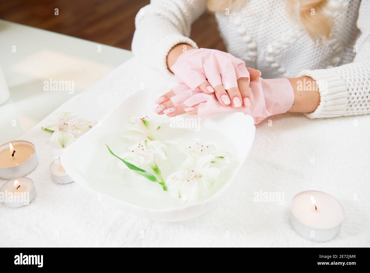 Woman hand care. Hands and spa relaxing. Beauty woman nails. Stock Photo