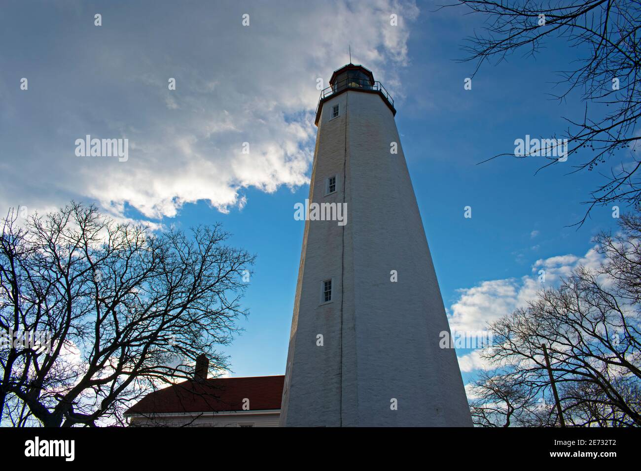 Lighthouse in Sandy Hook, New Jersey, during daylight hours, with the