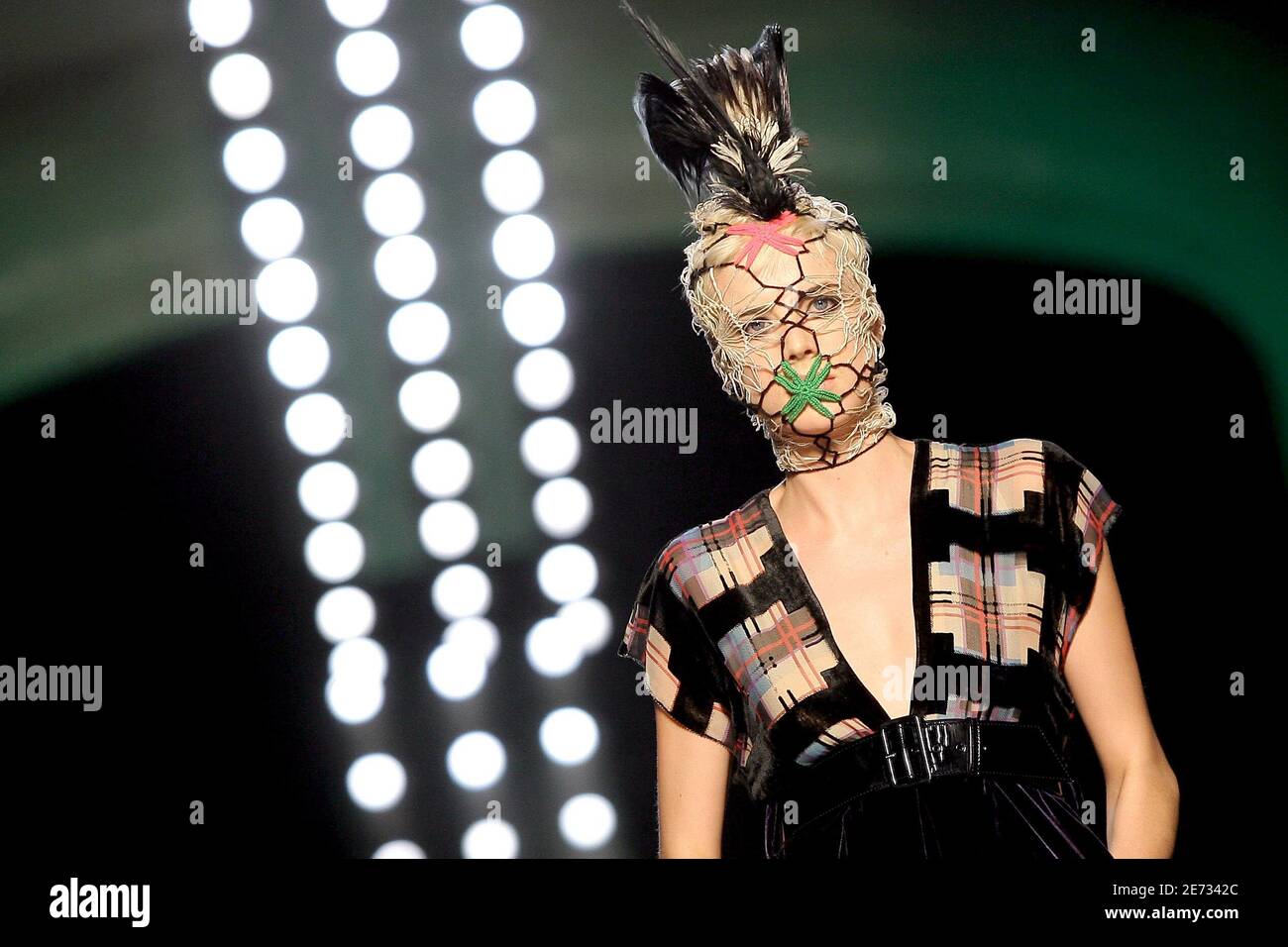 A model displays a creation by French 