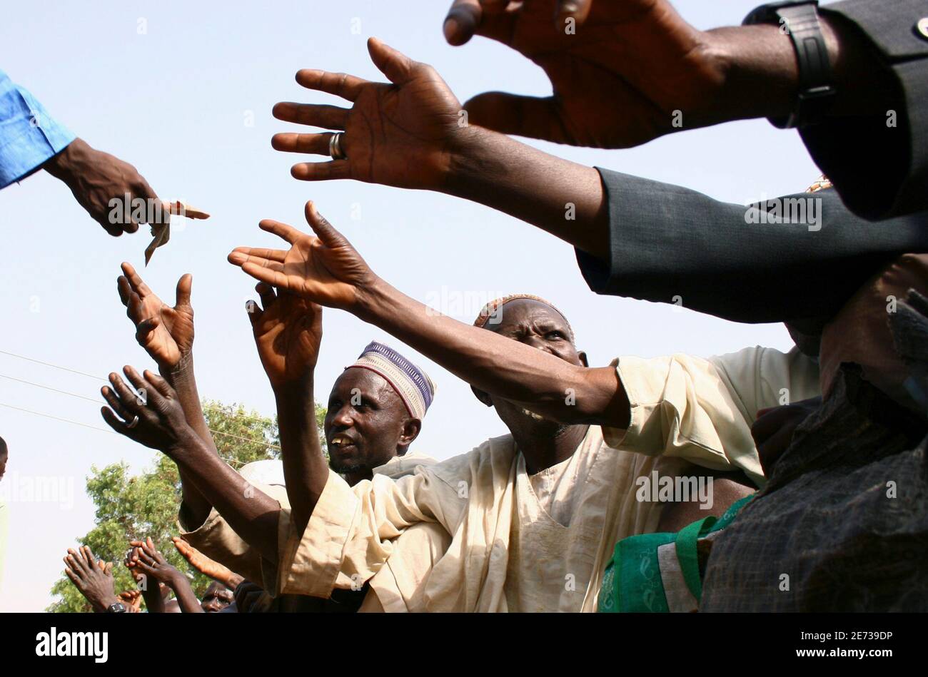 Beggers Reach Out For Alms During The Muslim Holiday Of Eid Al Adha In Abuja December 30 06 Reuters Afolabi Sotunde Nigeria Stock Photo Alamy Beggers Reach Out For Alms During The Muslim Holiday Of Eid Al Adha In Abuja December 30 06 Reuters Afolabi Sotunde Nigeria Stock Photo Alamy