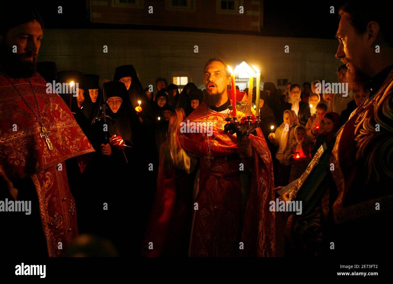 A priest of Saint-Nickolas monastery leads an Orthodox Easter mass in the town of Maloyaroslavets, some 130 km (81 miles) south-west of Moscow early April, 27 2008. REUTERS/Denis Sinyakov   (RUSSIA) Stock Photo