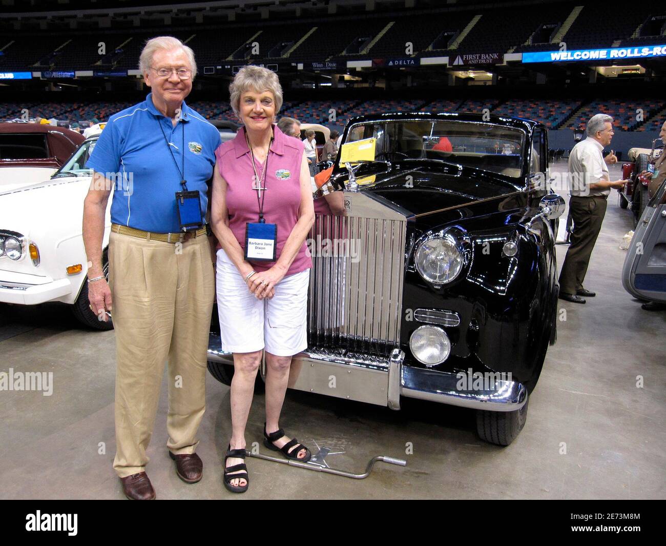 Hamilton and Jane Dixon pose beside their 1954 Rolls Royce Silver Wraith at  the Rolls-Royce Owners Club at the Louisiana Superdome in New Orleans June  20, 2009. The mood was buoyant at
