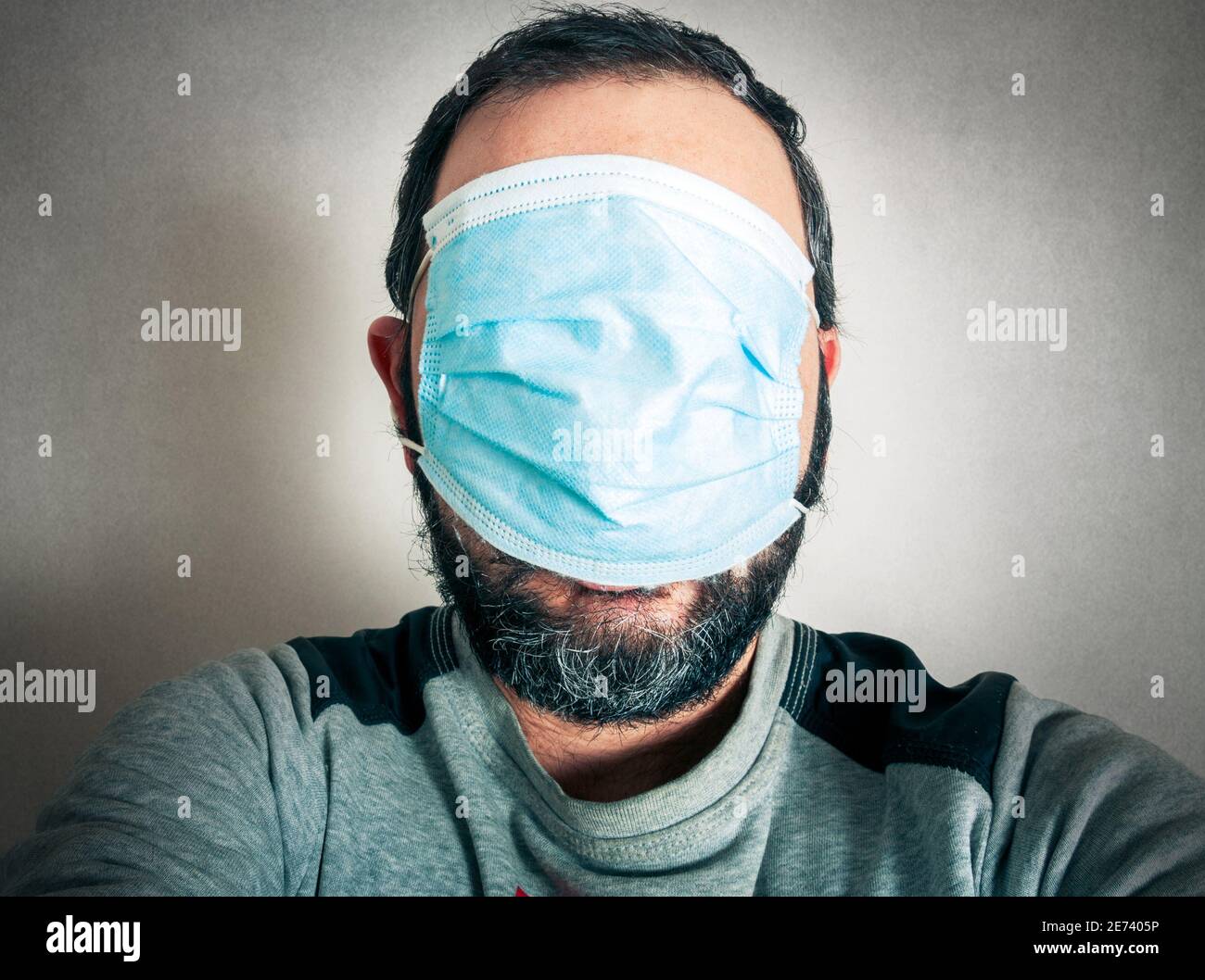 Funny bearded man white mask hires stock photography and images Alamy