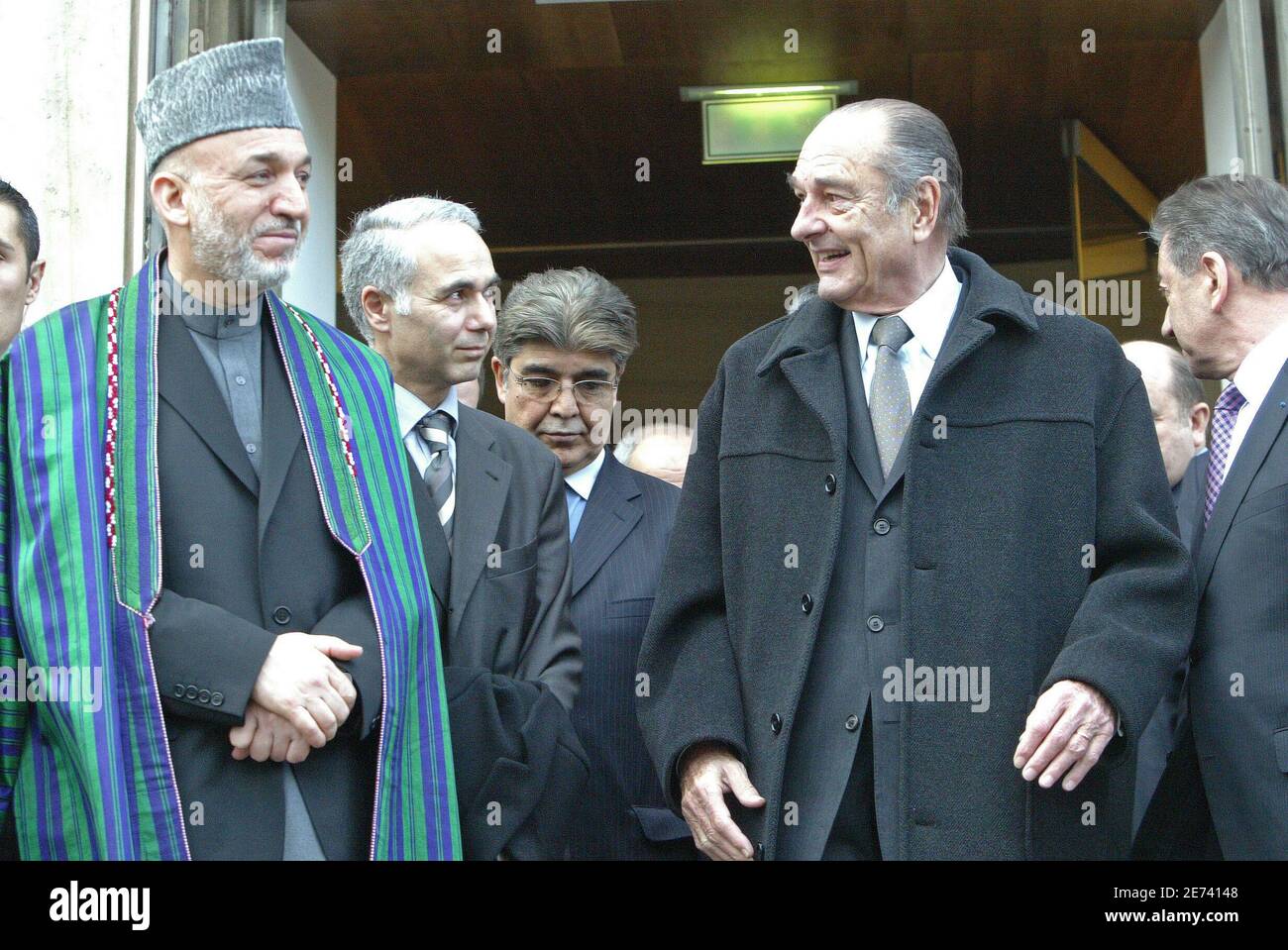 President Jacques Chirac welcomes his afghan counterpart Hamid Karzai at the exhibition 'Afghanistan Treasures' at the Guimet Museum in Paris, France, Monday, March 19, 2007. Photo by Bernard Bisson/ABACAPRESS.COM Stock Photo