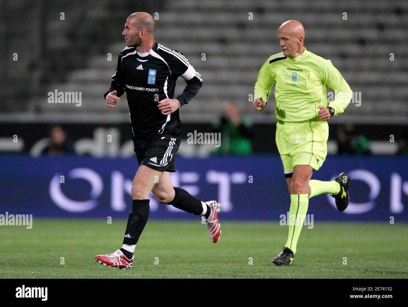 Retired soccer star Zinedine Zidane and referee Pierluigi Collina