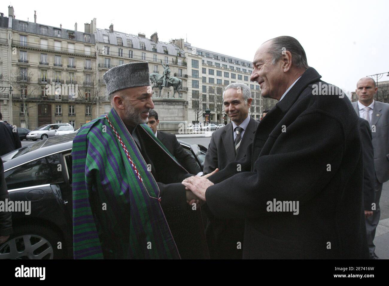 President Jacques Chirac welcomes his Afghan counterpart Hamid Karzai at the exhibition 'Afghanistan Treasures' at the Guimet Museum in Paris, France, Monday, March 19, 2007. Photo by Bernard Bisson/ABACAPRESS.COM Stock Photo