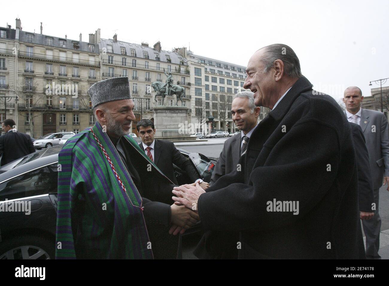 President Jacques Chirac welcomes his Afghan counterpart Hamid Karzai at the exhibition 'Afghanistan Treasures' at the Guimet Museum in Paris, France, Monday, March 19, 2007. Photo by Bernard Bisson/ABACAPRESS.COM Stock Photo