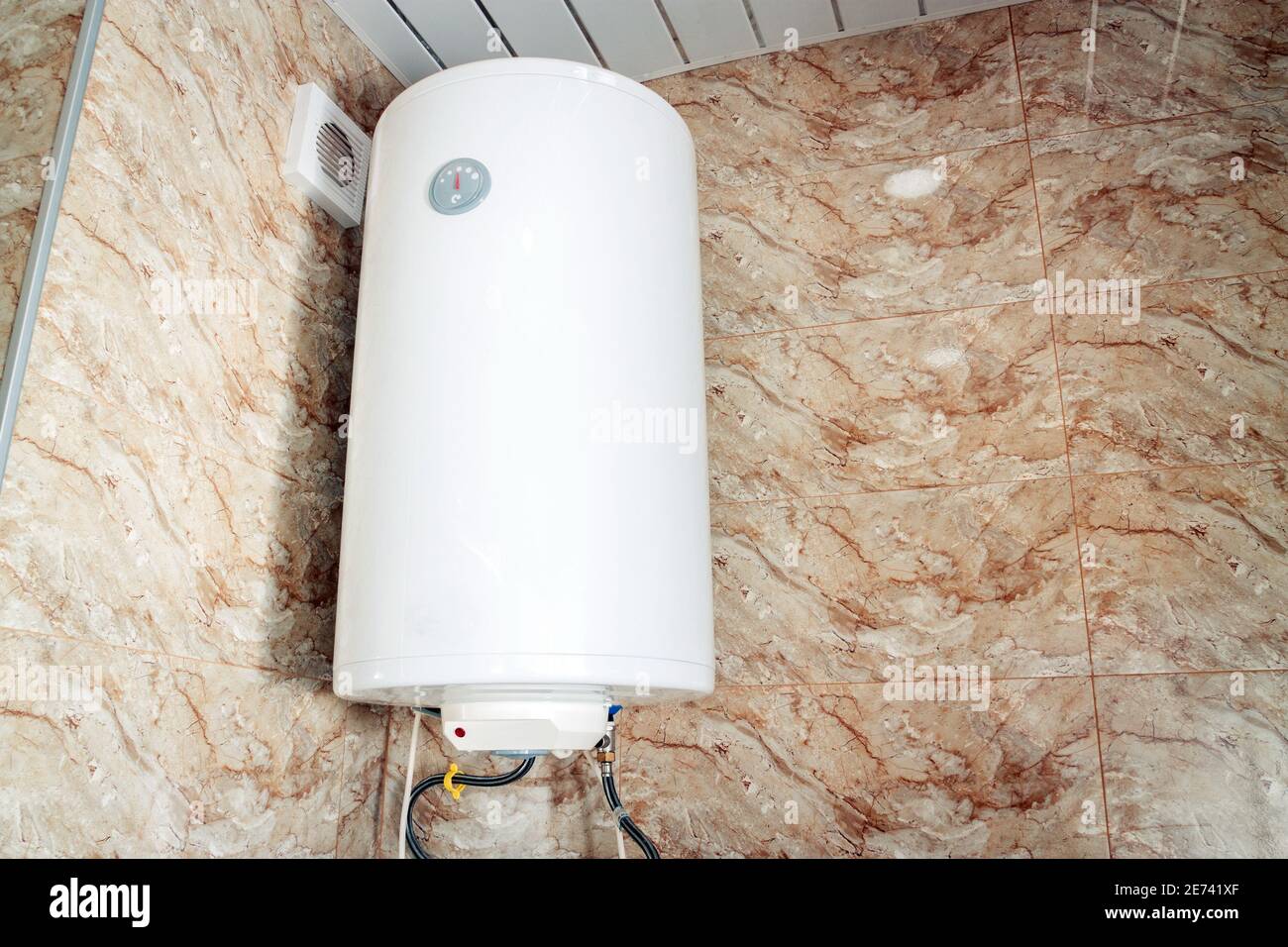 Hot water boiler tank in bathroom Stock Photo Alamy