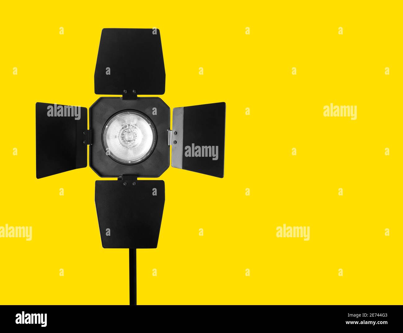 Studio strobe flash on the yellow Stock Photo