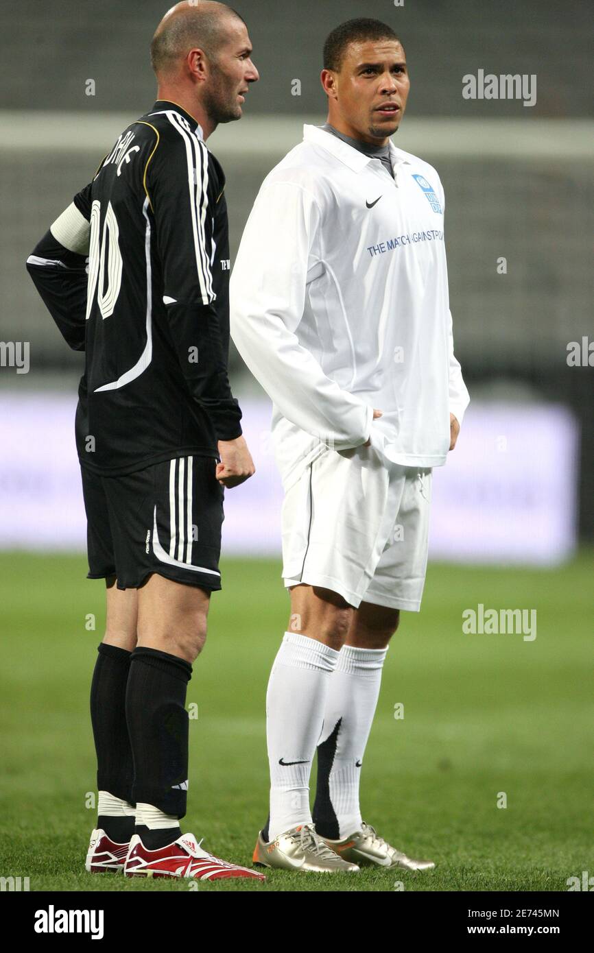 Former Real Madrid's teammates Ronaldo and Zinedine Zidane pictured during  the United Nations Development Program charity soccer match at the  Velodrome stadium in Marseille, France on March 19, 2007. The Match Against