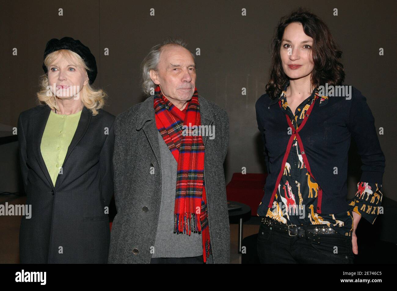 Actresses Bulle Ogier and Jeanne Balibar and director Jacques Rivette pose  together as they arrive to the premiere of their new film 'Ne Touchez pas a la  Hache', held at the 'Centre