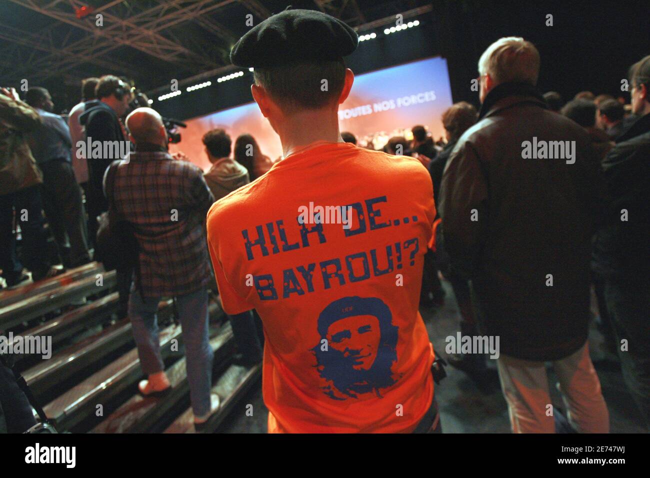 A supporter wearing an orange tee-shirt attends Union for the French Democraty (UDF) centrist party president and candidate for the upcoming 2007 presidential elections Francois Bayrou during a campaign meeting held at the Zenith in Paris.France, on March 21, 2007. Photo by Corentin Fohlen/ABACAPRESS.COM Stock Photo