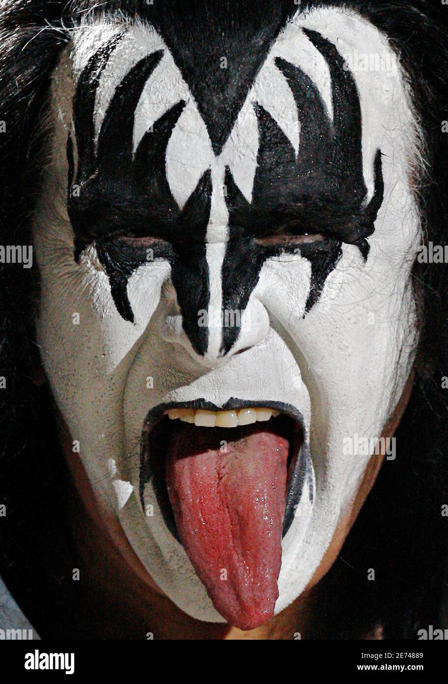 KISS bassist Gene Simmons sticks out his tongue as he performs during the  Summer Festival in Quebec City July 16, 2009. REUTERS/Mathieu Belanger  (CANADA ENTERTAINMENT Stock Photo - Alamy