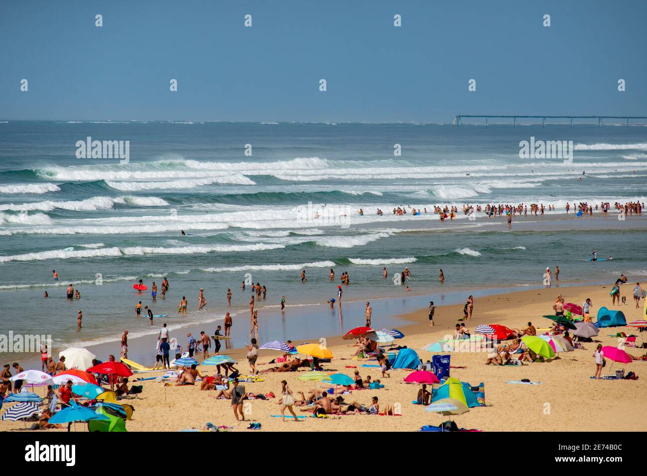 Crowded beach in Biscarrosse Plage, Nouvelle Aquitaine, France. Biscarrosse is an important holiday destination in the Landes, southwestern France Stock Photo
