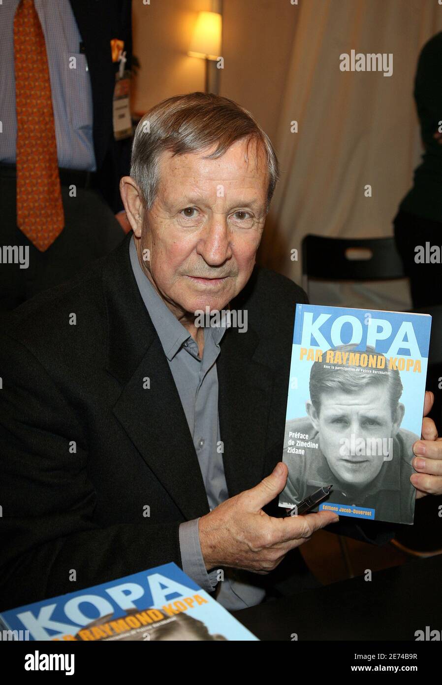 French former football player Raymond Kopa poses during the Book Fair 'Le  Salon Du Livre' held