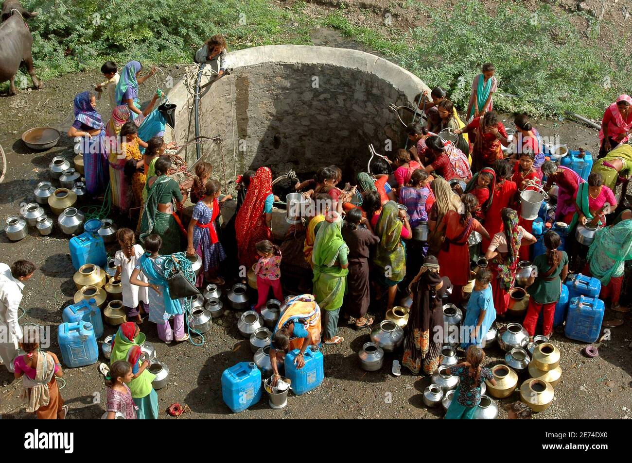 People Gather Around A Village Well To Draw Drinking Water In The Village Of Chokadi In India S Western State Of Gujarat June 28 06 The Village Is Among 0 Villages Hit By People Gather Around A Village Well To Draw Drinking Water In The Village Of Chokadi In India S Western State Of Gujarat June 28 06 The Village Is Among 0 Villages Hit By
