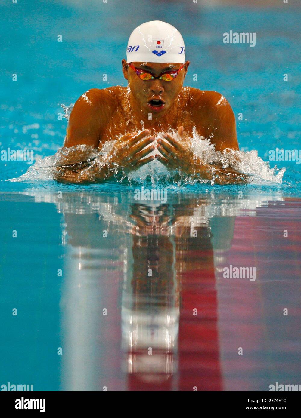 Japan's Daisuke Kimura swims during the men's 200m breaststroke swimming  heats at the 15th Asian Games in Doha December 7, 2006. REUTERS/Jerry Lampen  (QATAR Stock Photo - Alamy