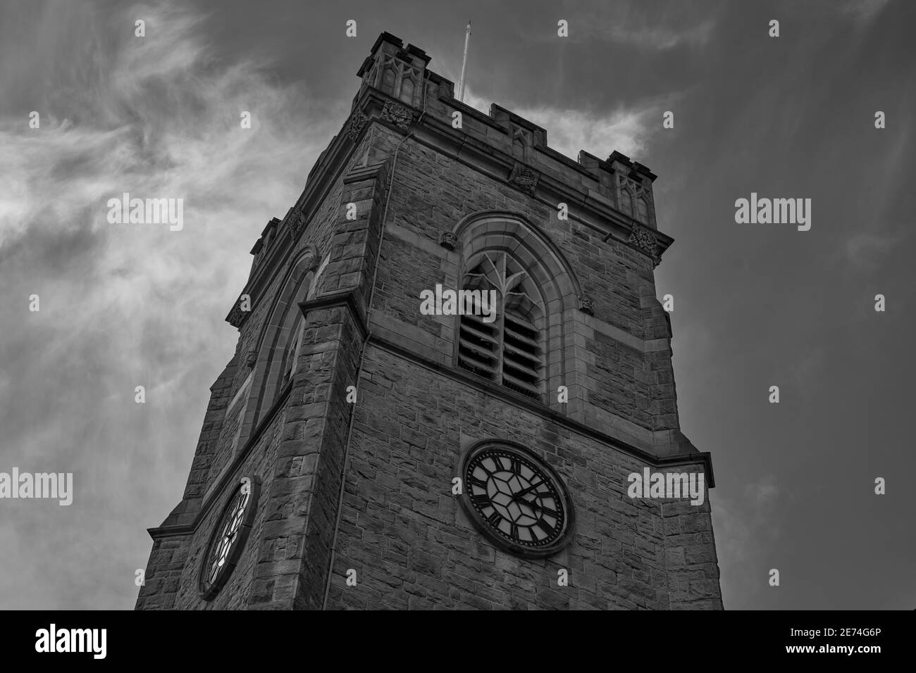 Church of England clock tower arched windows Stock Photo