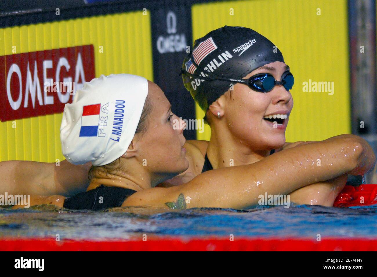 USA's Natalie Coughlin wins the gold medal and France's Laure Manaudou wins the silver on women's 100 meters backstroke during the 12th FINA World Championships, at the Rod Laver Arena, in Melbourne, Australia, on March 27, 2007. Photo by Nicolas Gouhier/Cameleon/ABACAPRESS.COM Stock Photo