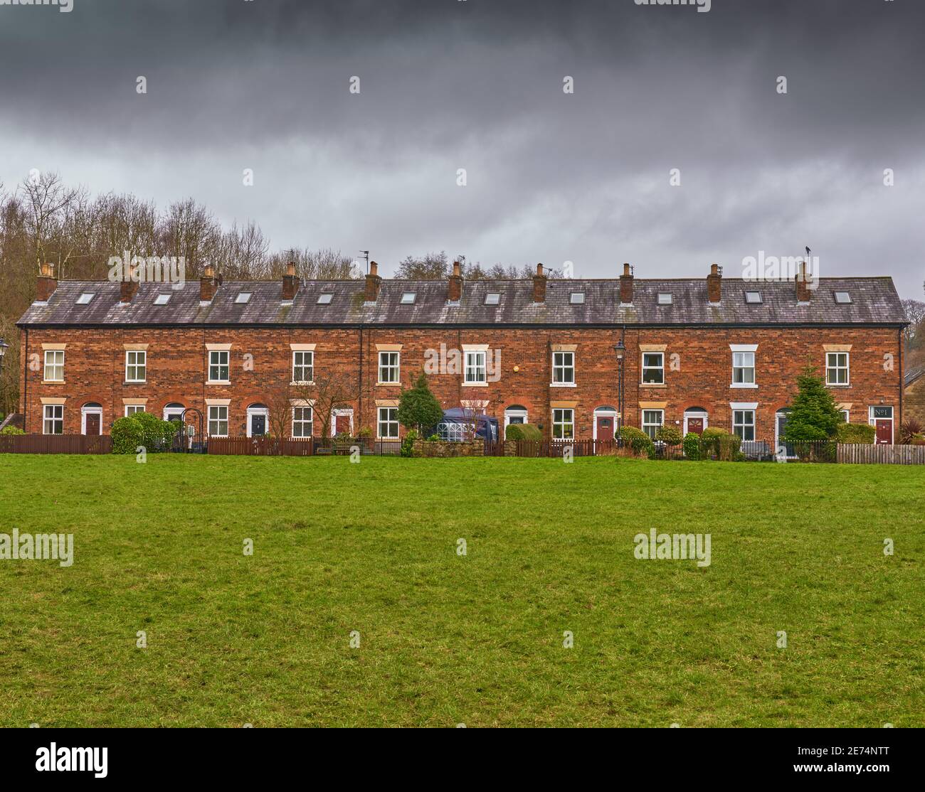 A row of terrace houses in Summerseat Village Stock Photo