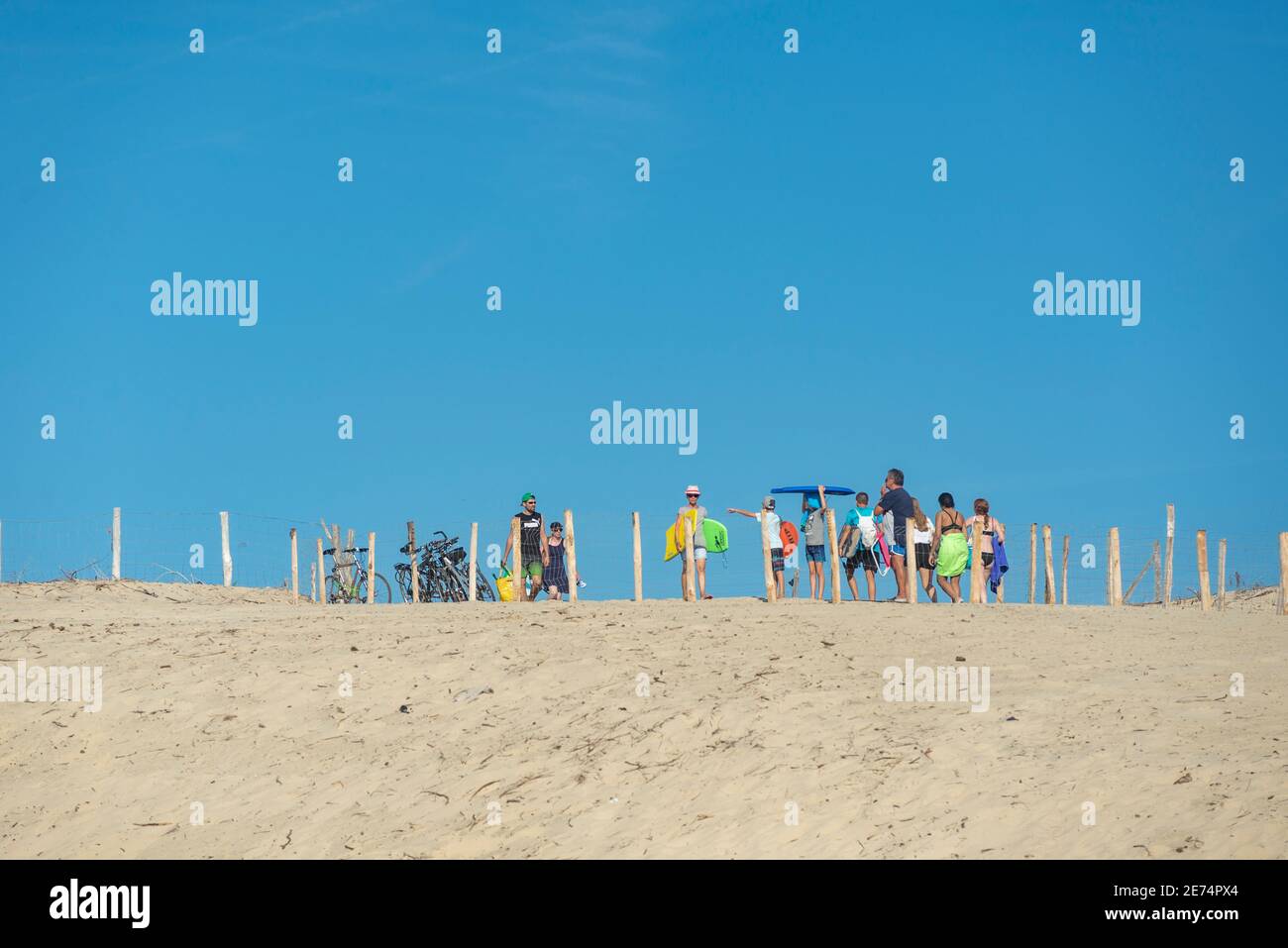 People coming ang going from the beach in Biscarrosse Plage, France, during a hot august Stock Photo