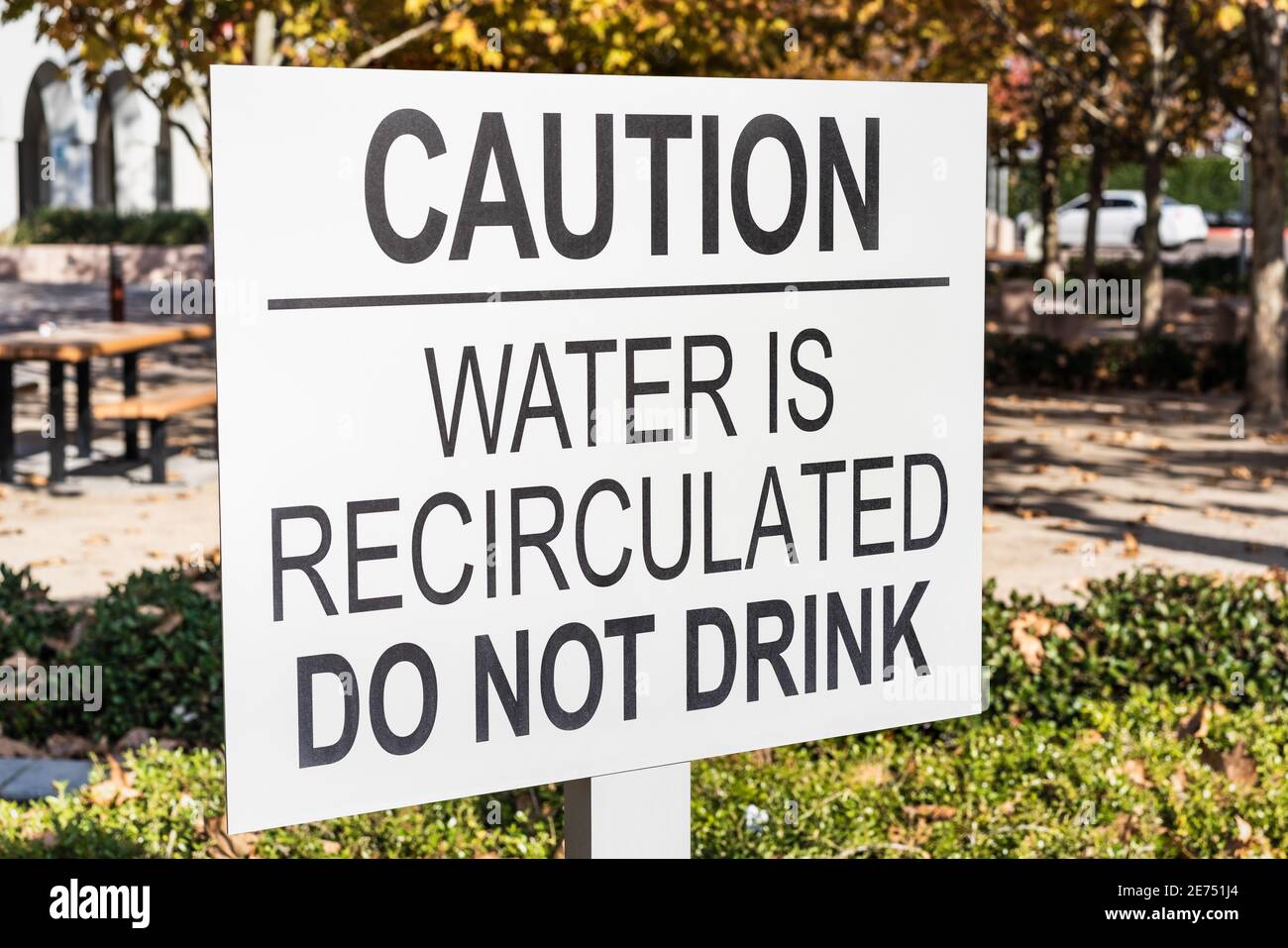 Close up of 'Caution / Water is recirculated / do not drink' sign; San Francisco Bay Area, California Stock Photo