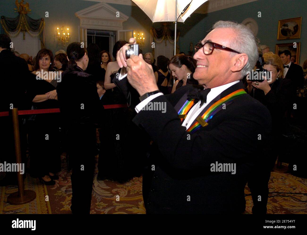 2007 Kennedy Center Honoree and Academy Award winning film director Martin Scorsese takes a picture at the end of a Gala Dinner at the State Department in Washington December 1, 2007. The 30th annual awards honor lifetime achievement in the performing arts.  REUTERS/Mike Theiler (United States) Stock Photo