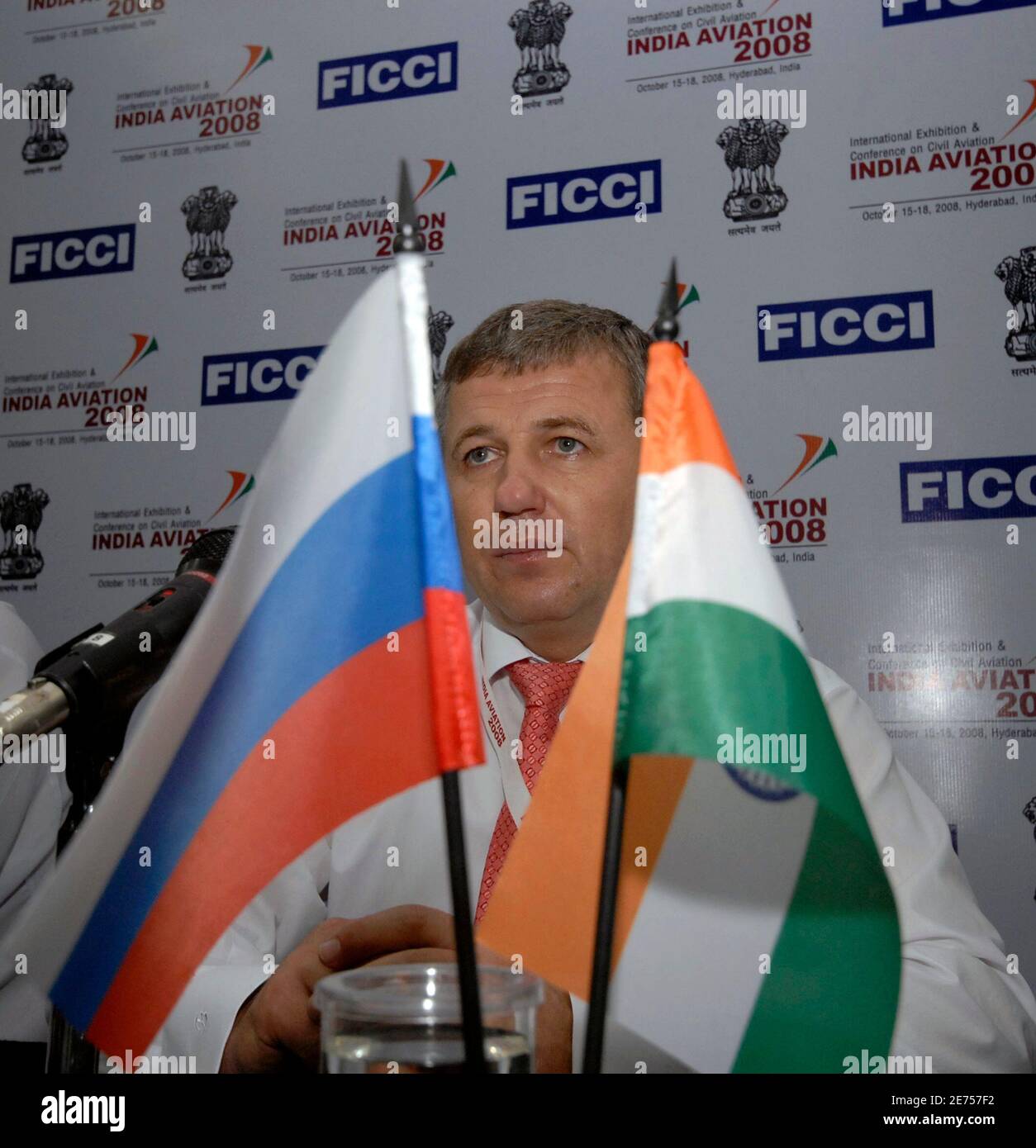 Yuri Grudinin, Director of Transport Aviation Programs Directorate of United Aircraft Corporation, Russia attends a news conference during India's first civil aviation exhibition and conference India Aviation 2008 in the southern Indian city of Hyderabad October 17, 2008. The exhibition is the first international exhibition of its kind in India, which starts from October 15 to 18.    REUTERS/Krishnendu Halder (INDIA) Stock Photo