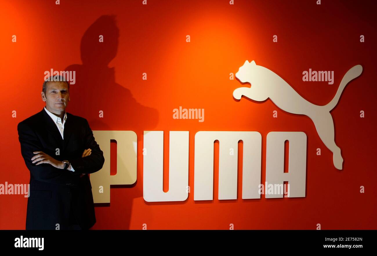 Jochen Zeitz, CEO of German sports goods firm Puma arrives for the annual  news conference in Nuremberg February 18, 2009. World number three  sportswear maker Puma reported a 76.7 percent drop in