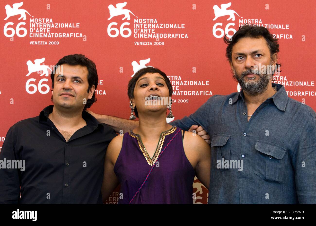 Producer Vikas Bahl (L), editor Bharathi Mehra (C) and director Rakeysh Omprakash Mehra attend the ''Delhi-6' ' photocall at the Palazzo del Casino during the 66th Venice Film Festival September 9, 2009.  REUTERS/Alessandro Bianchi   (ITALY ENTERTAINMENT) Stock Photo