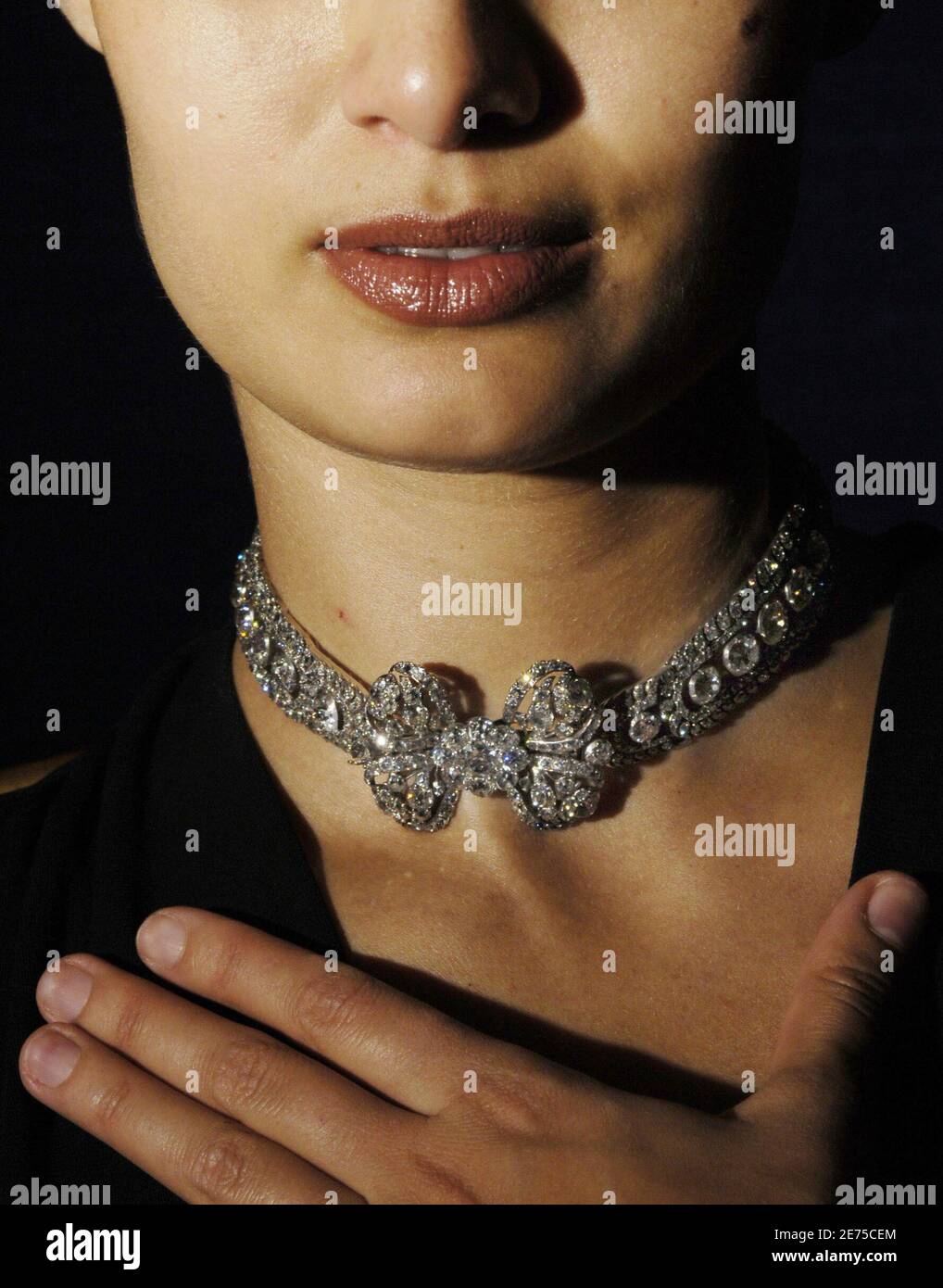 A model displays a diamond necklace from the collection of the Russian imperial family believed to have been made for Catherine the Great, Empress of Russia 1762-1796, at Sotheby's in Geneva, Switzerland, November 9, 2005. The ornament is expected to fetch between $ 1'150'000 and 1'950'000 when auctioned off in Geneva on November 17. Stock Photo