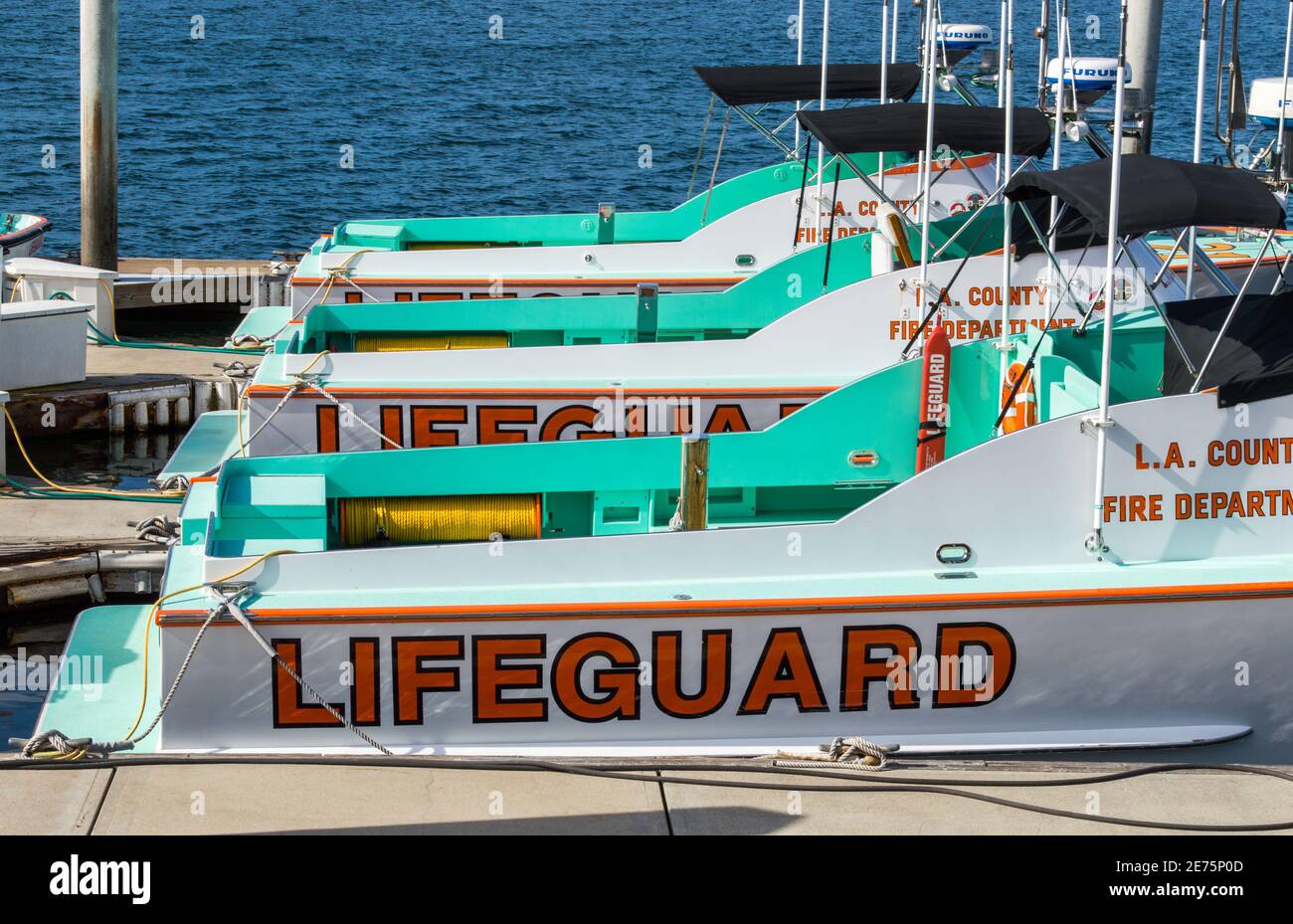 Three Los Angeles County lifeguard boats docked in Marina Del Rey, California, USA Stock Photo