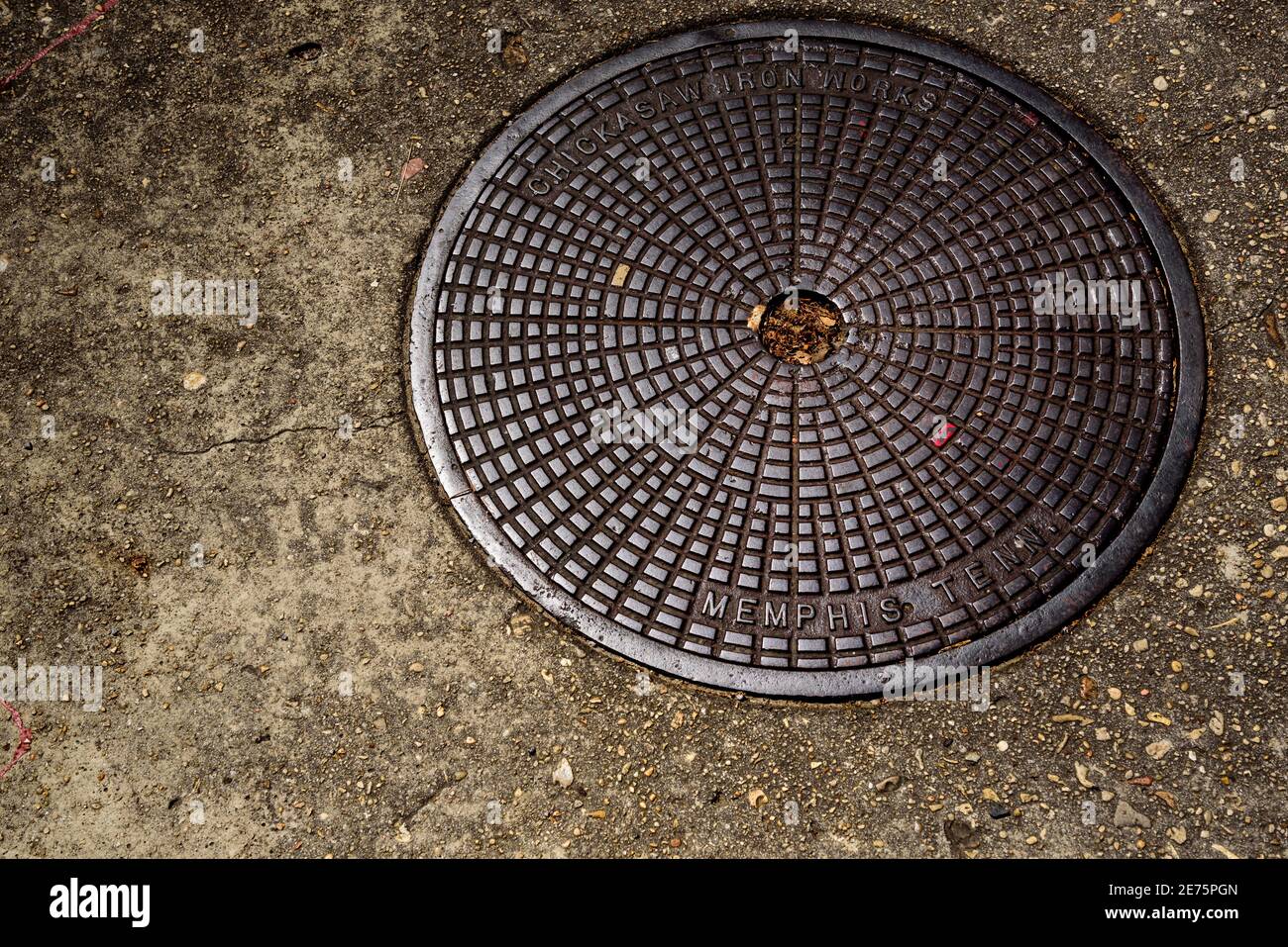 Manhole Cover with Memphis Engraved Stock Photo