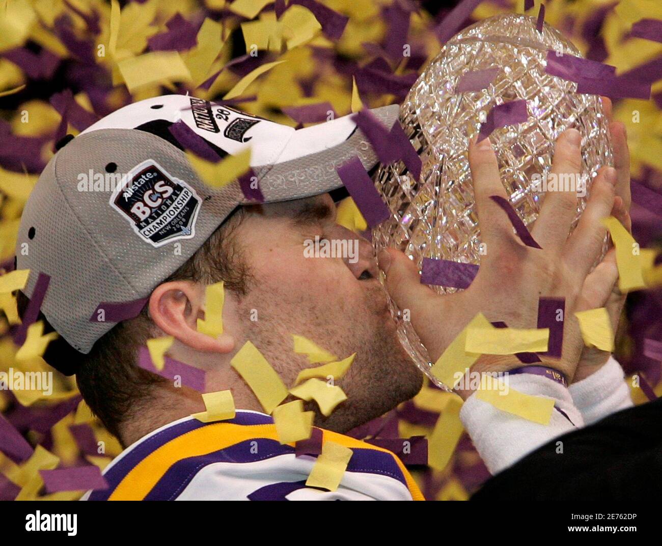 LSU Tigers quarterback Matt Flynn kisses the trophy after his team defeated the Ohio State Buckeyes to win the NCAA BCS National Championship football game in New Orleans January 7, 2008.     REUTERS/Jeff Haynes (UNITED STATES) Stock Photo