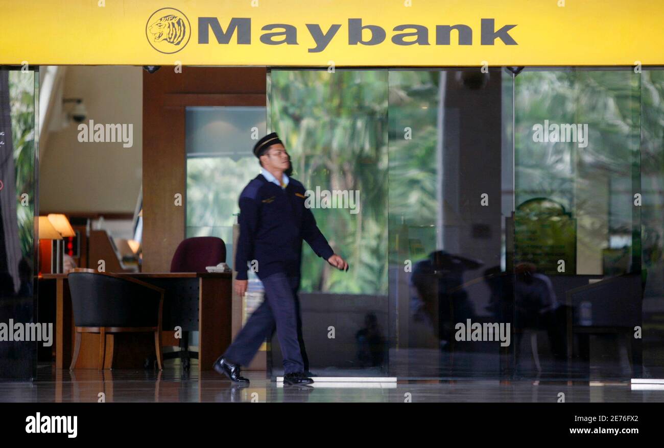 A Man Leaves A Maybank Branch In Kuala Lumpur May 5 2008 Malaysia S Top Lender Malayan Banking Has Bought A 15 Percent Stake In Pakistan S Largest Listed Lender Mcb Bank For 680