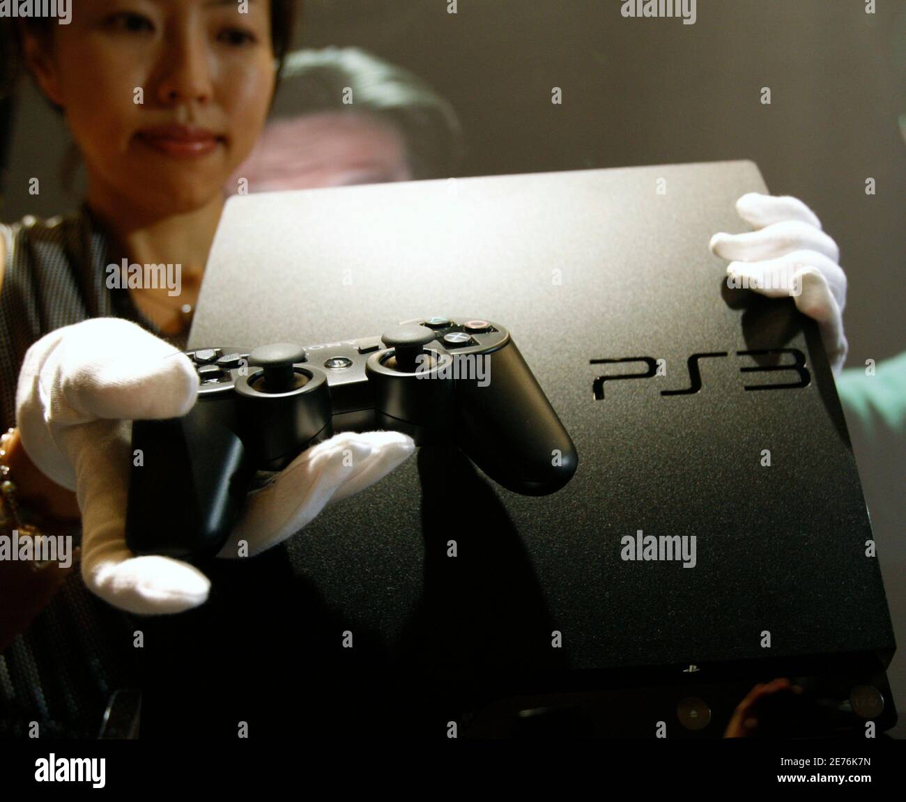Sony Corp's new PlayStation 3 game console is displayed during a news  conference in Tokyo August 19, 2009. Sony Corp will launch a slimmer,  cheaper version of its PlayStation 3 game console