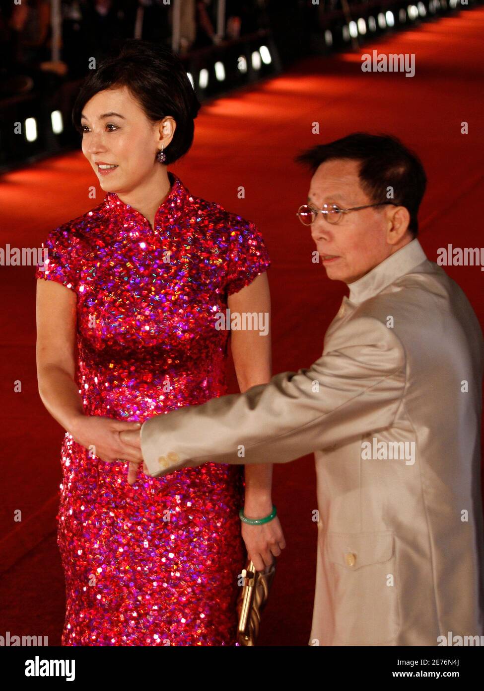 Hong Kong actor Lau Kar-leung and his wife Mary Jean Reimer arrive for the  Hong Kong Film Awards presentation ceremony April 18, 2010. REUTERS/Tyrone  Siu (CHINA - Tags: ENTERTAINMENT PROFILE Stock Photo -