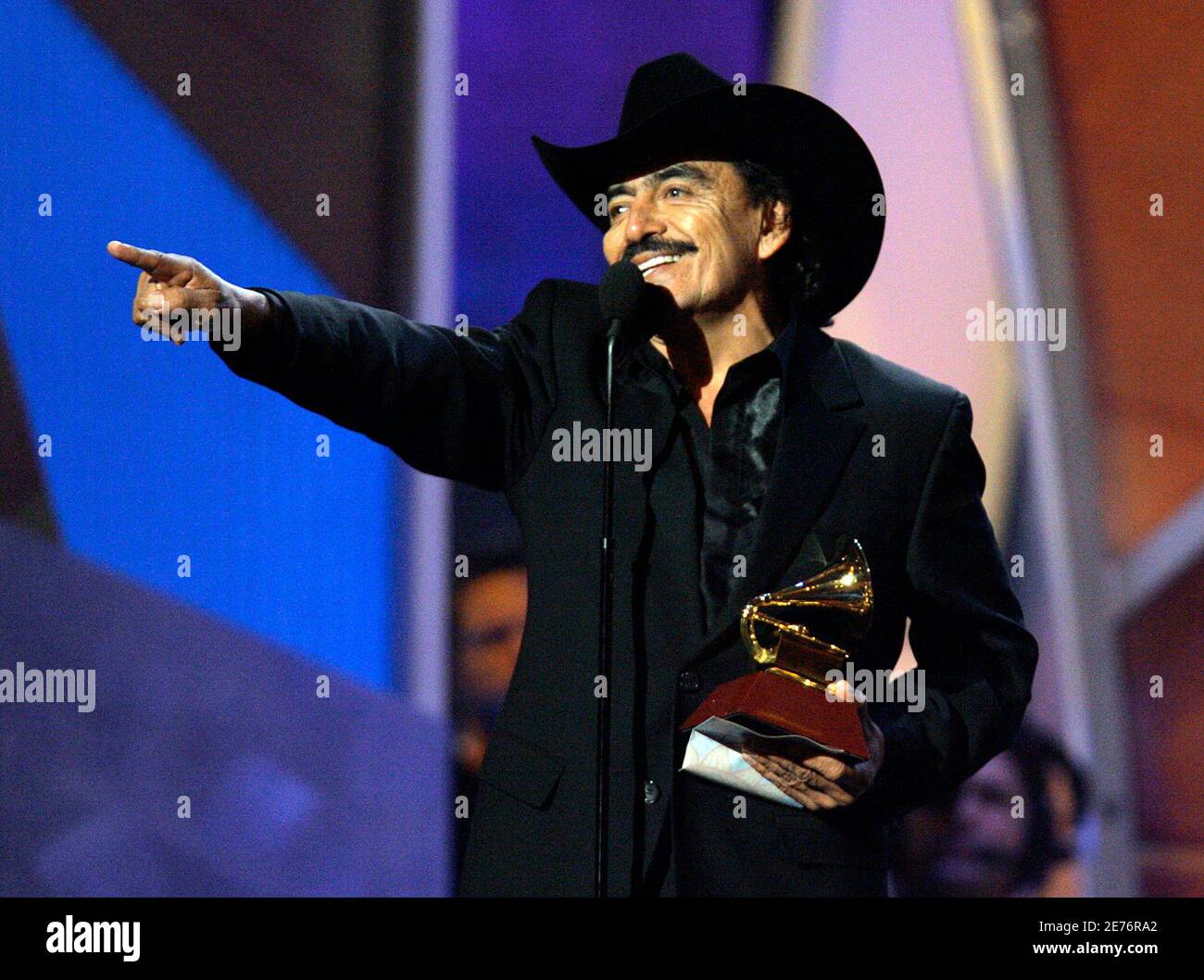 Joan Sebastian accepts the award for Best Banda Album for the song "Mas  Alla Del Sol" at the 7th annual Latin Grammy Awards in New York November 2,  2006. REUTERS/Gary Hershorn (UNITED