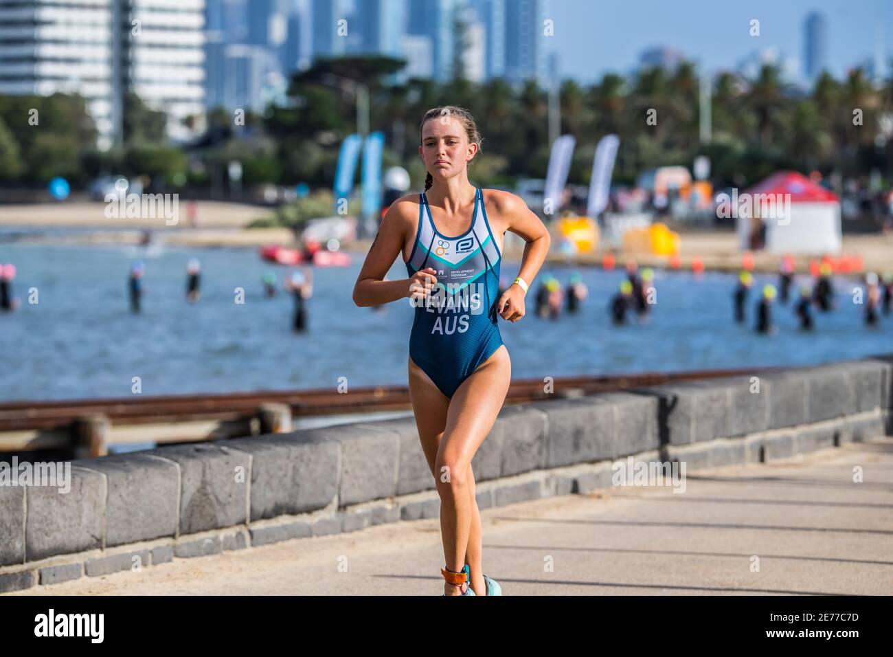 Melbourne, Australia. 17th Jan, 2021. Junior Elite female triathlete, Ola Evans running along the waterfront during the 2XU Triathlon Series 2021, Race 1 at St Kilda Beach. Credit: SOPA Images Limited/Alamy Live News Stock Photo