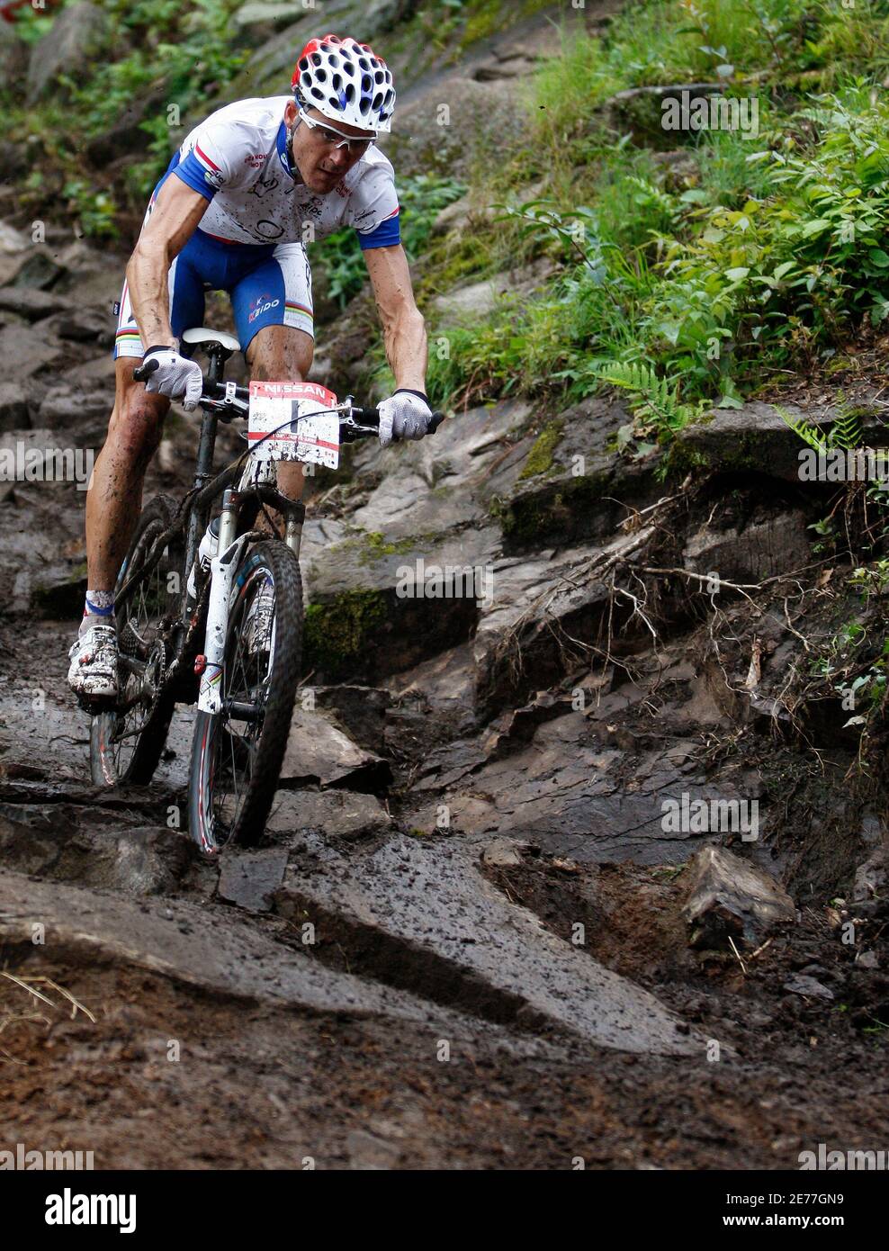 France's Julien Absalon cycles during the men's UCI Mountain Bike World Cup competition at Ste-Anne in Beaupre, July 26, 2009. Absalon won the competition. REUTERS/Mathieu Belanger (CANADA SPORT CYCLING Stock
