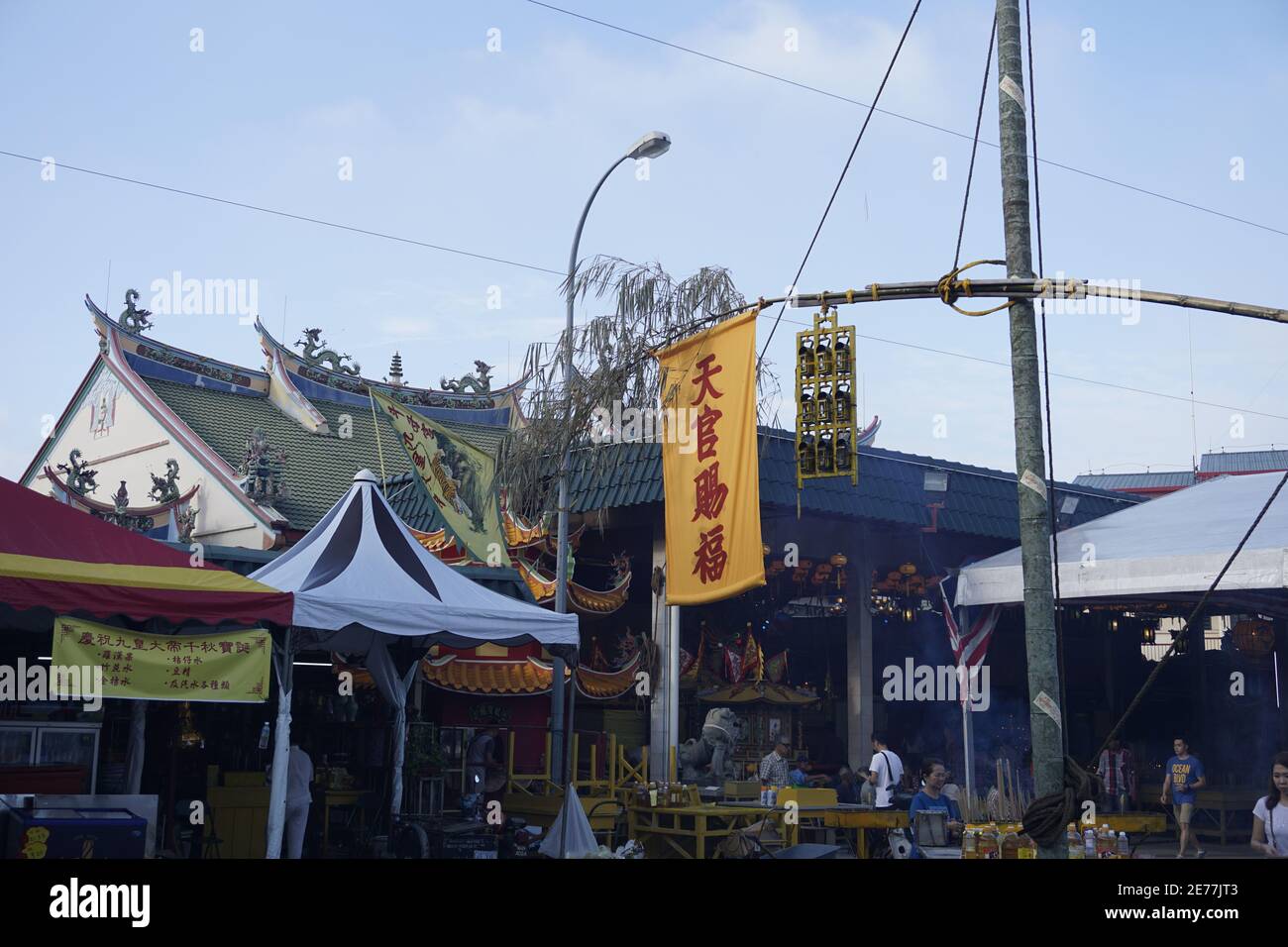 lantern pole raised at temple during Nine Emperor Gods Festival in Malaysia Stock Photo