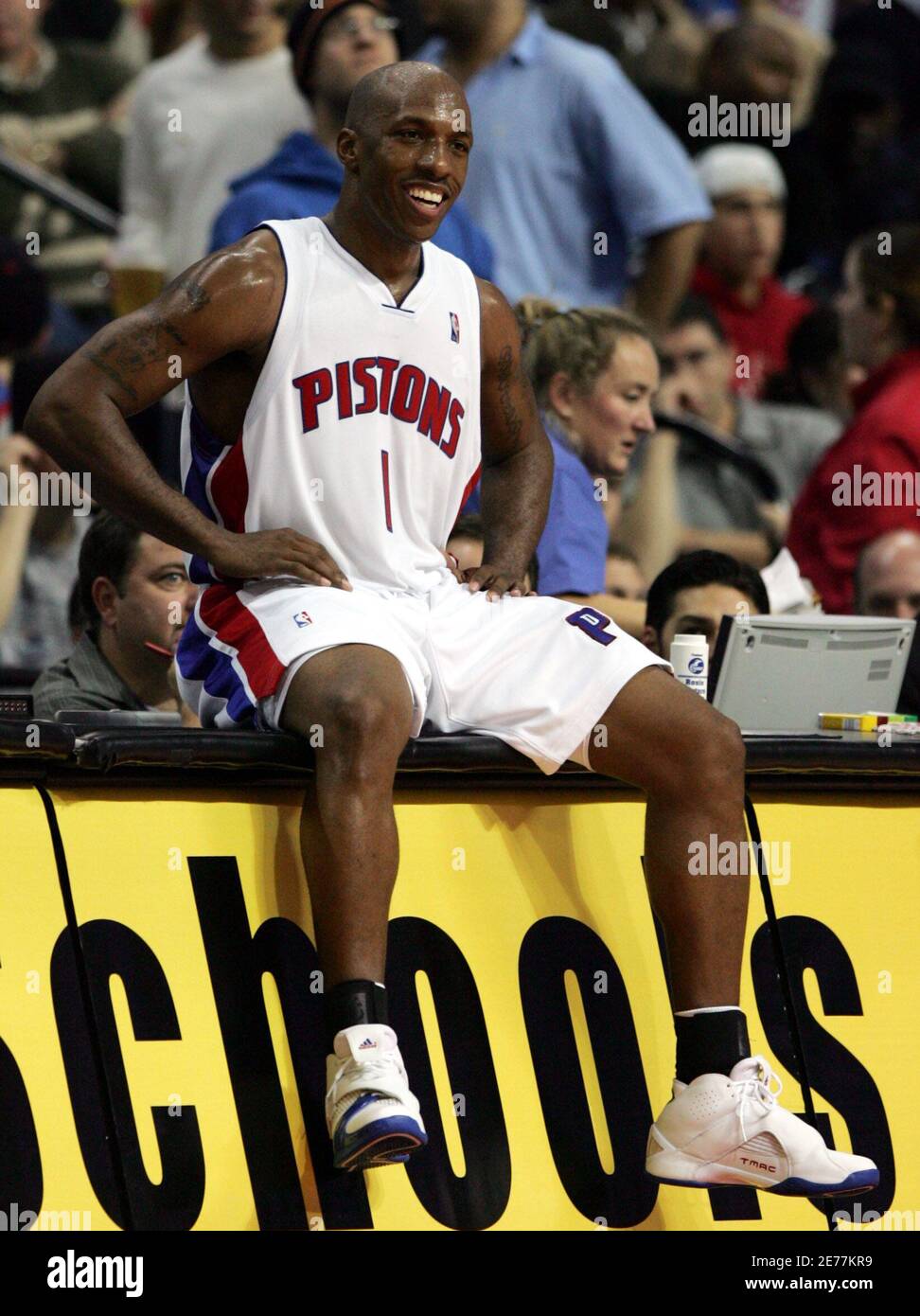 Detroit Pistons guard Chauncey Billups sits for a few seconds on the scorers table as he reacts to being called for a foul against the Boston Celtics during the third quarter of their NBA game at the Palace in Auburn Hills, Michigan November 15, 2005. Billups scored 17 of his 25 points in the third quarter as Detroit defeated Boston 115-110. REUTERS/Rebecca Cook Stock Photo