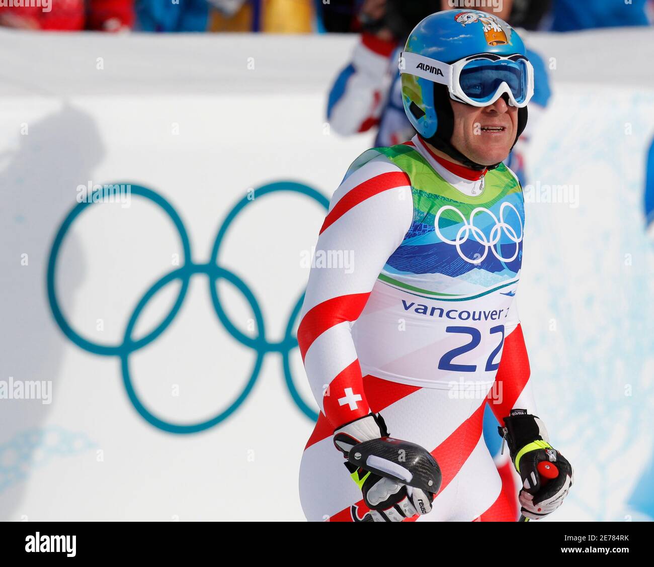 Didier Cuche of Switzerland looks at his time after competing in the men's  Alpine Skiing Downhill