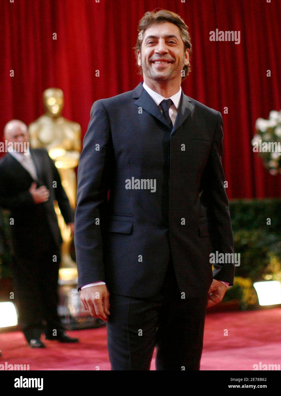 Spanish actor Javier Bardem, dressed in Prada, nominee for the Oscar for  best supporting actor for his work in "No Country for Old Men," arrives at  the 80th annual Academy Awards, the