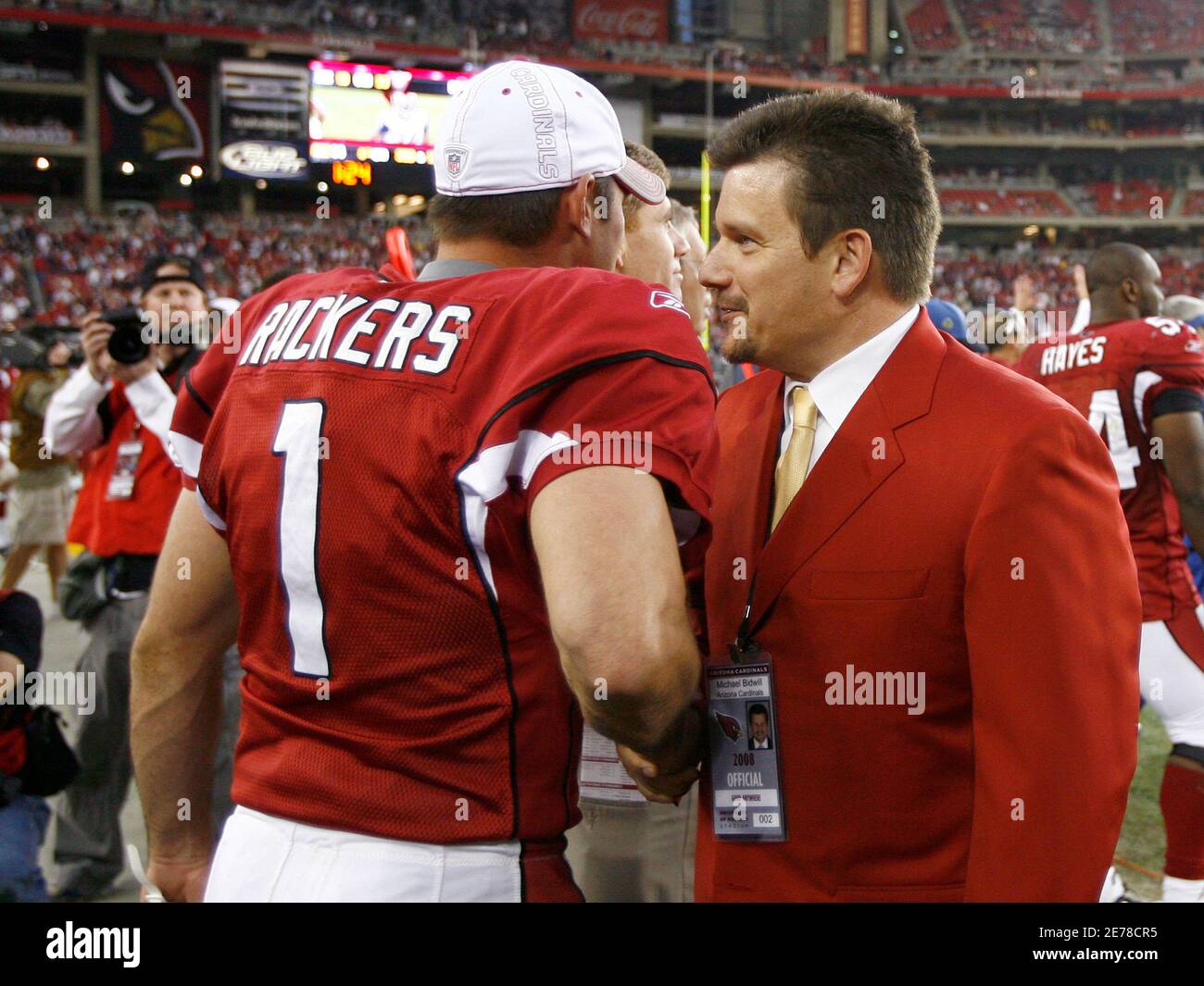 Arizona Cardinals kicker Neil Rackers (L) celebrates with president Michael Bidwill (R) after defeating the St Louis Rams and capturing the NFC West during an NFL game in Glendale, Arizona, December 7, 2008. REUTERS/Rick Scuteri (UNITED STATES) Stock Photo