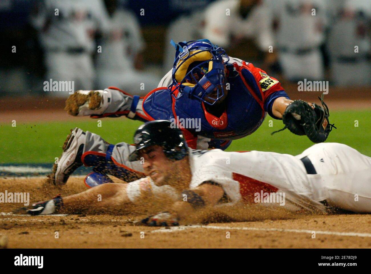 Team Usa Baserunner David Wright Front Touches Home Plate To Score As Team Puerto Rico Catcher Geovany Soto Makes The Late In The Second Inning During Their Second Round World Baseball Team Usa Baserunner David Wright Front Touches Home Plate To Score As Team Puerto Rico Catcher Geovany Soto Makes The Late In The Second Inning During Their Second Round World Baseball